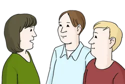 Zwei Personen hören einer Person zu